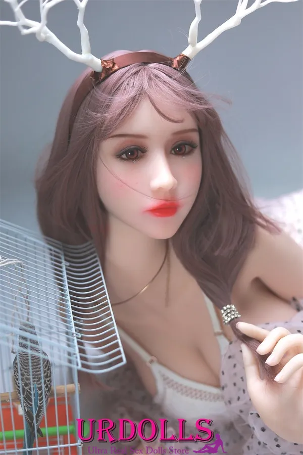 man sleeping with sex doll