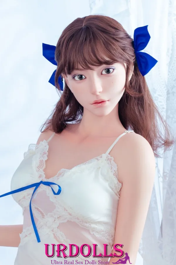 girl dressed in sex doll suit