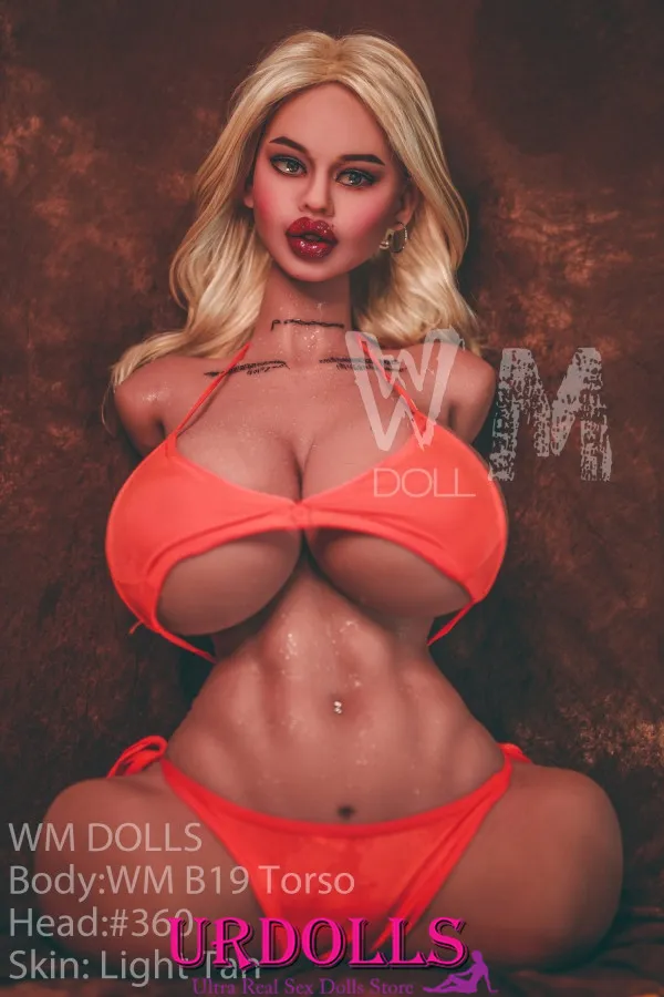 girl trying a male sex doll