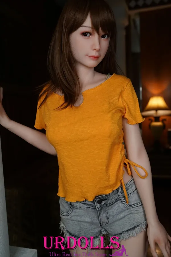 mummfied man next to sex doll